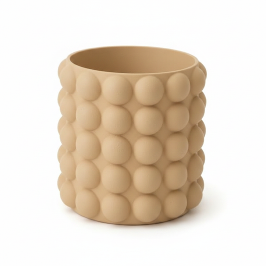 Tan bubble texture pot on white background