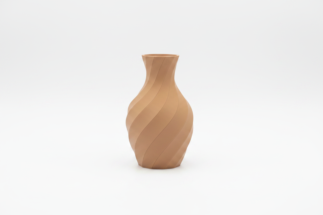 3D Printed Spiral Vase in tan on white background