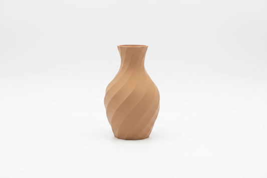 3D Printed Spiral Vase in tan on white background