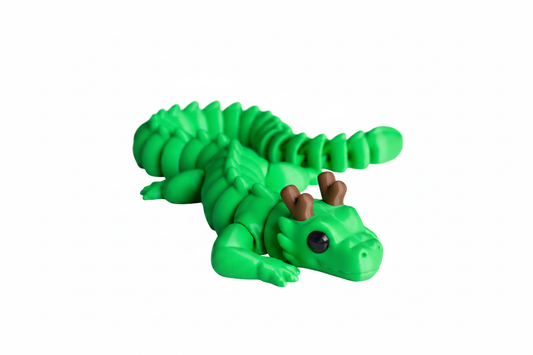 Articulated green dragon lizard 3D printed figurine on white background