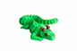 Articulated green dragon lizard 3D printed figurine on white background