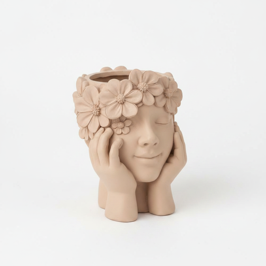 Ceramic face planter with flower crown and hands, tan color on white background