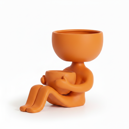 Orange Sitting Person Planter